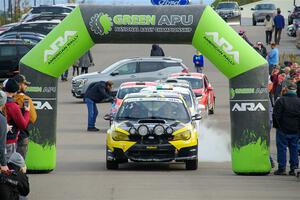 Colin Schulz / Jake Carlson Subaru WRX STi leaves the ceremonial start.