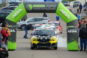 Colin Schulz / Jake Carlson Subaru WRX STi leaves the ceremonial start.