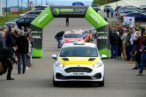 Al Kaumeheiwa / Cindy Krolikowski Ford Fiesta Rally3 leaves the ceremonial start.