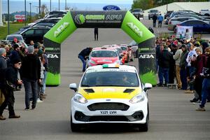 Al Kaumeheiwa / Cindy Krolikowski Ford Fiesta Rally3 leaves the ceremonial start.