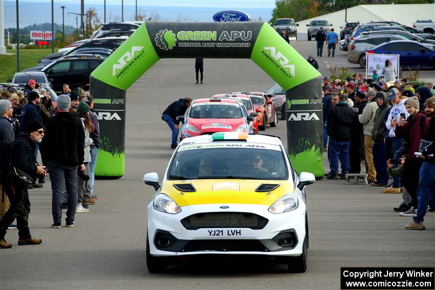 Al Kaumeheiwa / Cindy Krolikowski Ford Fiesta Rally3 leaves the ceremonial start.