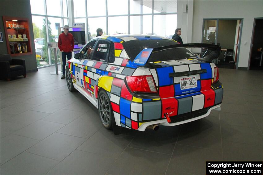 The former Nick Roberts / Rhianon Gelsomino Subaru WRX STi on display inside Fox Marquette Subaru.