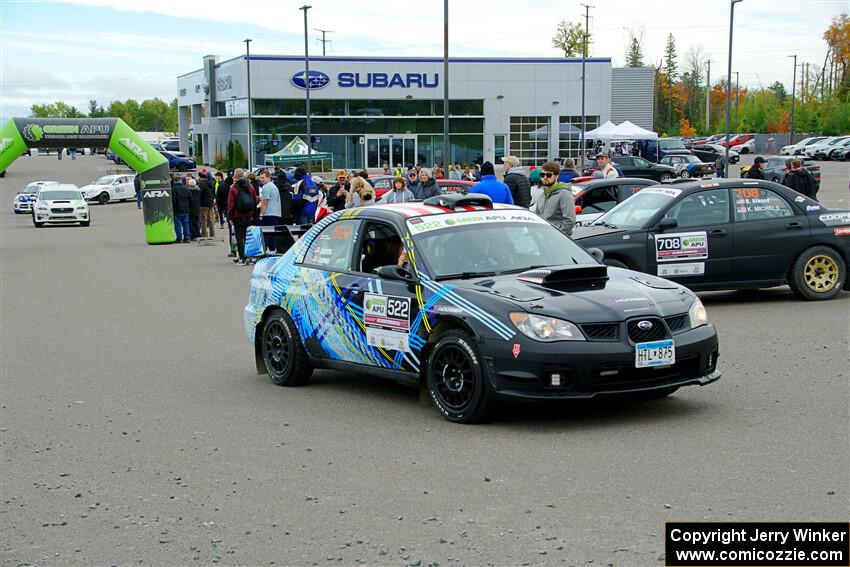 Matt James / Jackie James Subaru Impreza leaves the ceremonial start.