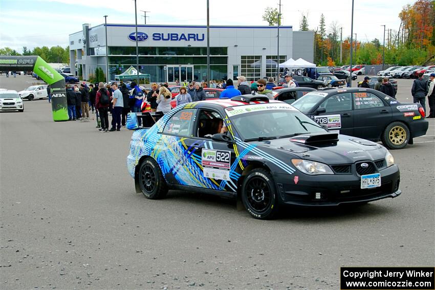 Matt James / Jackie James Subaru Impreza leaves the ceremonial start.