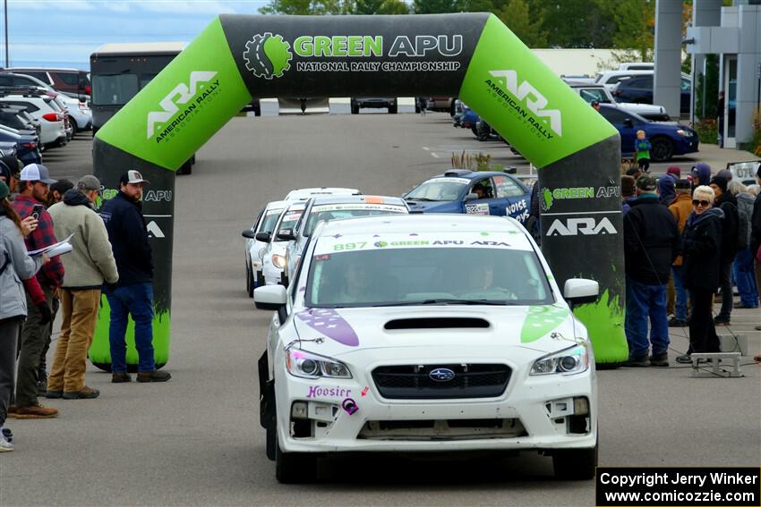 Jamey Randall / Andrew Rausch Subaru WRX leaves the ceremonial start.