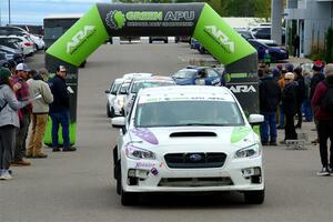 Jamey Randall / Andrew Rausch Subaru WRX leaves the ceremonial start.