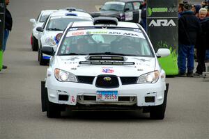 Pete Schaefer / Kevin Dobrowolski Subaru Impreza 2.5i leaves the ceremonial start.