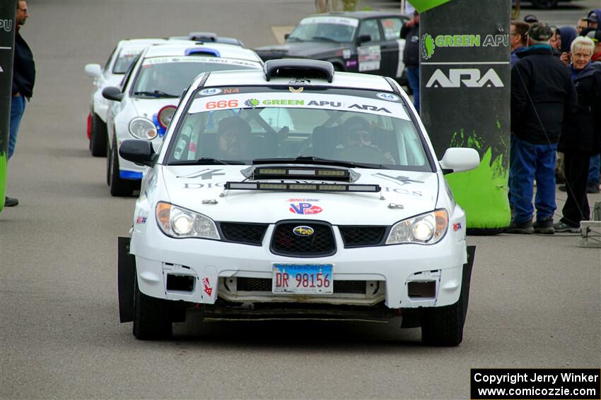 Pete Schaefer / Kevin Dobrowolski Subaru Impreza 2.5i leaves the ceremonial start.