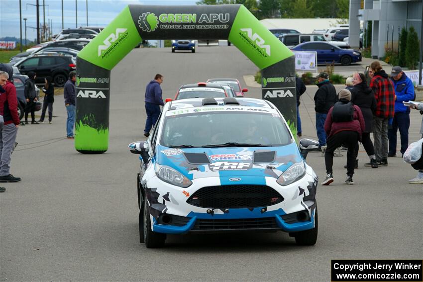 Alastair Scully / Alison LaRoza Ford Fiesta ST leaves the ceremonial start.