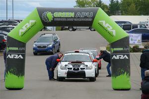 Jason Cook / Maggie Tu Subaru WRX at the ceremonial start.