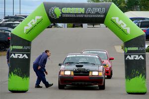 Neil CarlinSchauer / Tim Kohlmann Ford Mustang SVO at the ceremonial start.