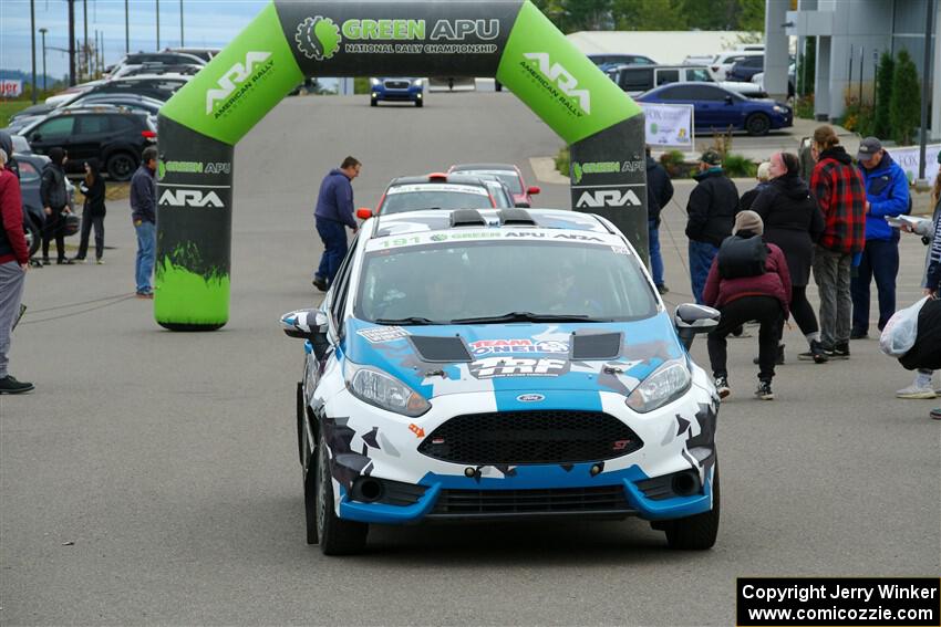 Alastair Scully / Alison LaRoza Ford Fiesta ST leaves the ceremonial start.