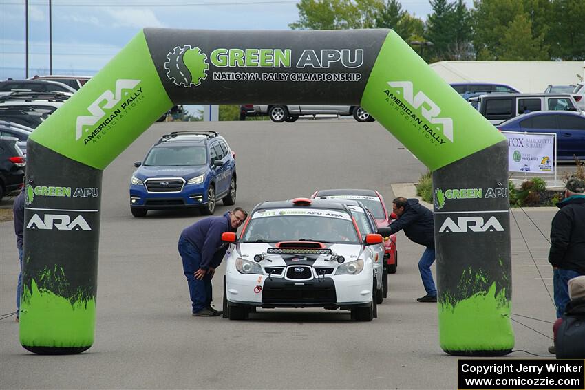 Jason Cook / Maggie Tu Subaru WRX at the ceremonial start.