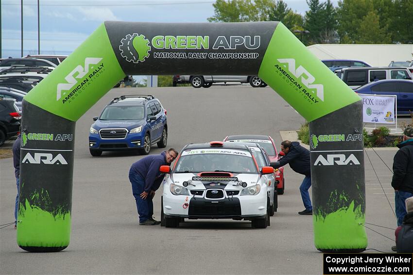 Jason Cook / Maggie Tu Subaru WRX at the ceremonial start.