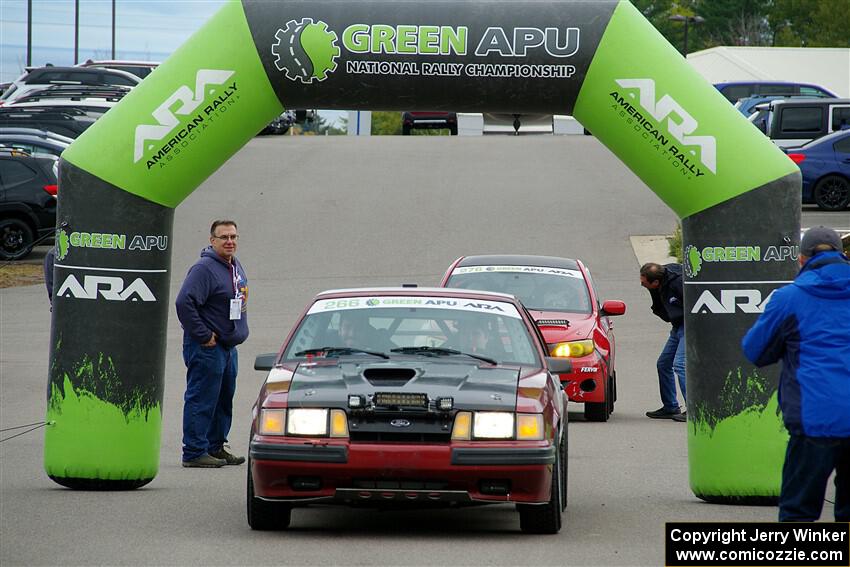 Neil CarlinSchauer / Tim Kohlmann Ford Mustang SVO leaves the ceremonial start.