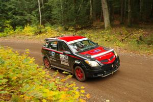 Doug Gekiere / Andrew Tuten Pontiac Vibe GT on SS2, Bob Lake I.