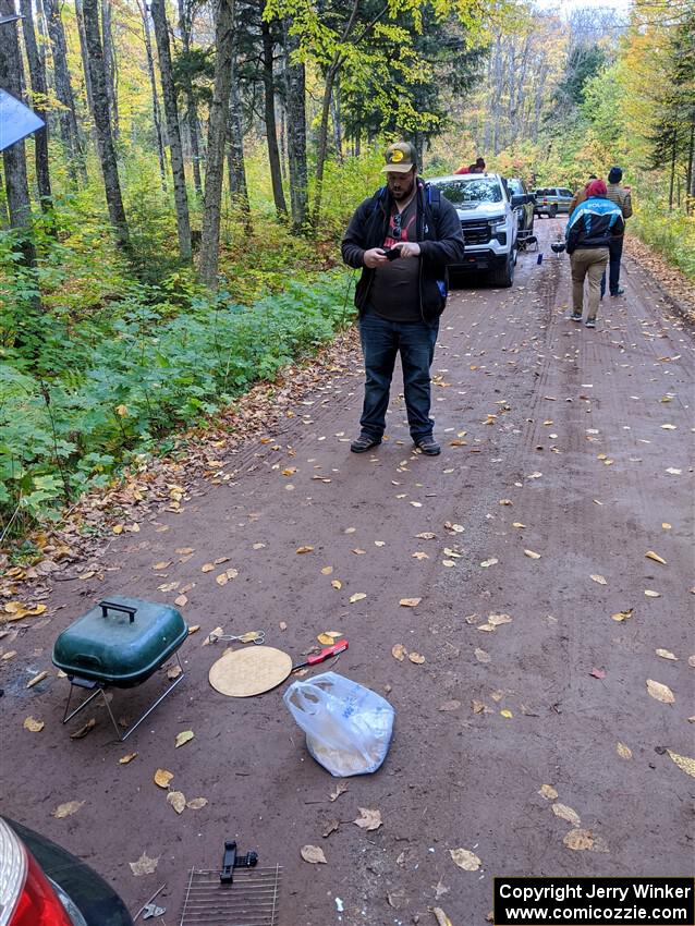 Tim Jarvis checks for phone service before SS6, Bob Lake II.