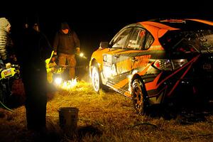 Grzegorz Bugaj / Ela Dziubanski Subaru WRX STi is cleaned at Sidnaw service after day one.