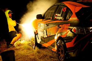 Grzegorz Bugaj / Ela Dziubanski Subaru WRX STi is cleaned at Sidnaw service after day one.