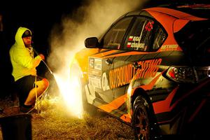 Grzegorz Bugaj / Ela Dziubanski Subaru WRX STi is cleaned at Sidnaw service after day one.