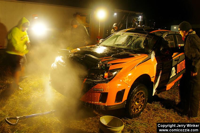 Grzegorz Bugaj / Ela Dziubanski Subaru WRX STi is cleaned at Sidnaw service after day one.