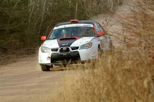 Jason Cook / Maggie Tu Subaru WRX on SS1.