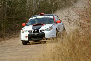 Jason Cook / Maggie Tu Subaru WRX on SS1.