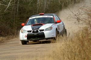 Jason Cook / Maggie Tu Subaru WRX on SS1.