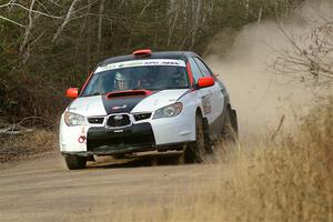 Jason Cook / Maggie Tu Subaru WRX on SS1.