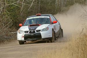 Jason Cook / Maggie Tu Subaru WRX on SS1.