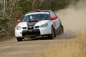 Jason Cook / Maggie Tu Subaru WRX on SS1.