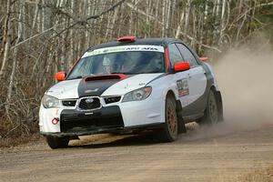 Jason Cook / Maggie Tu Subaru WRX on SS1.