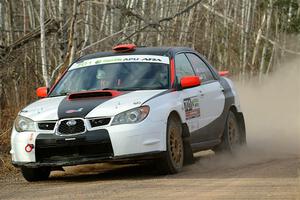 Jason Cook / Maggie Tu Subaru WRX on SS1.