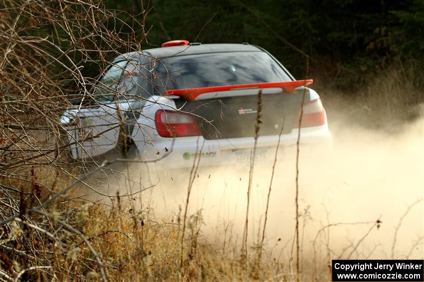 Jason Cook / Maggie Tu Subaru WRX on SS1.