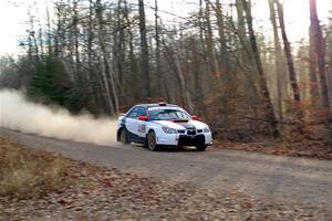 Jason Cook / Maggie Tu Subaru WRX on SS2.