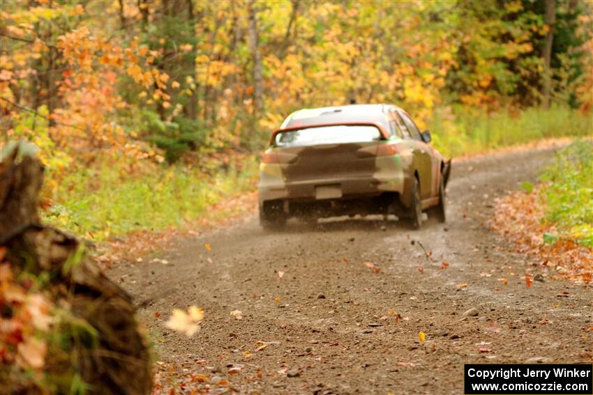 Sumit Panjabi / Michelle Rogers Mitsubishi Lancer Evo X on SS13, Trouble.