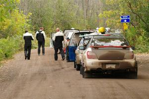 The lineup to the start of SS16, Mount Marquette, with Jason Cook / Maggie Tu Subaru WRX at the end.