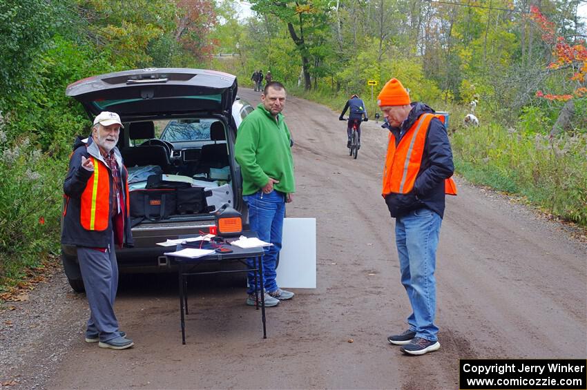 Jimmy Brandt and others work a check-in control for SS16, Mount Marquette.