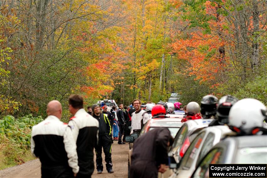 Teams congregate for the start of SS16, Mount Marquette, among the fall colors.