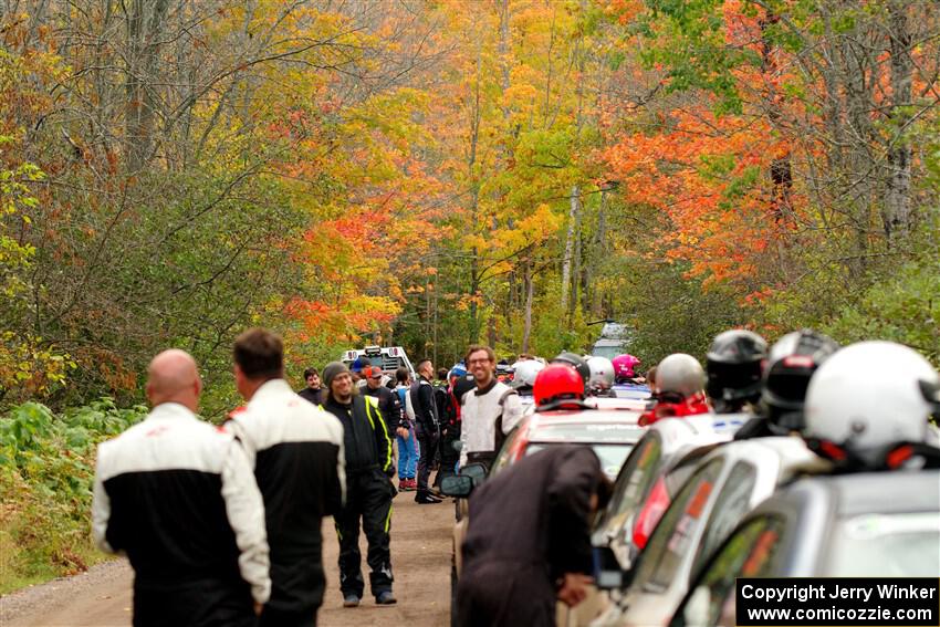 Teams congregate for the start of SS16, Mount Marquette, among the fall colors.