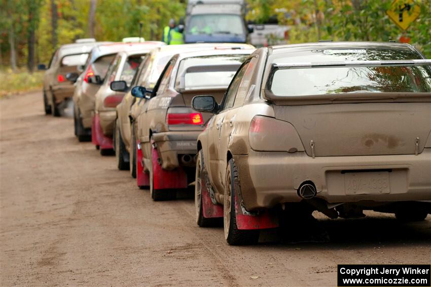 The lineup to the start of SS16, Mount Marquette, with John Farrow / Michael Farrow Subaru WRX at the end.