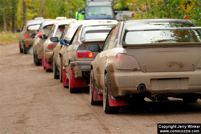 The lineup to the start of SS16, Mount Marquette, with John Farrow / Michael Farrow Subaru WRX at the end.