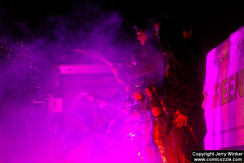 Winners Brandon Semenuk and Keaton Williams spray the crowd with champagne after winning the event in their Subaru WRX ARA24.