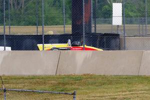 Dave Weitzenhof's Citation 95SFZ hits the wall hard at turn 13.