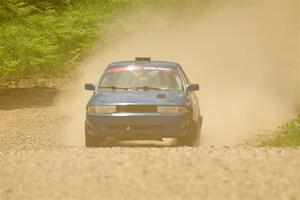 Jacob Kennedy / James Smith Ford Escort GT on SS1, Camp 3 North.