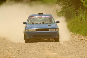 Jacob Kennedy / James Smith Ford Escort GT on SS1, Camp 3 North.