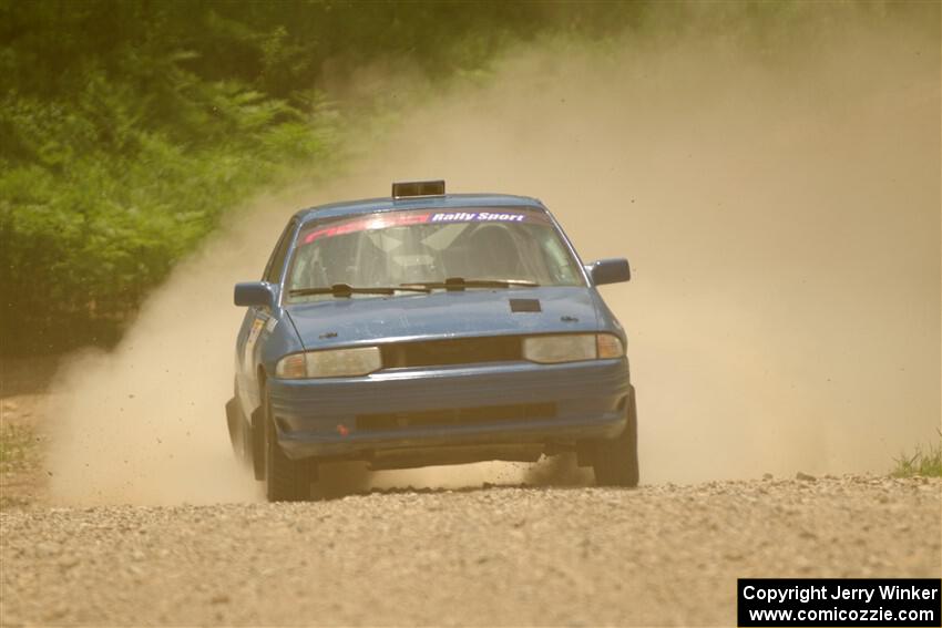 Jacob Kennedy / James Smith Ford Escort GT on SS1, Camp 3 North.