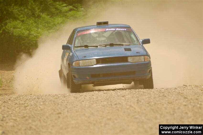 Jacob Kennedy / James Smith Ford Escort GT on SS1, Camp 3 North.