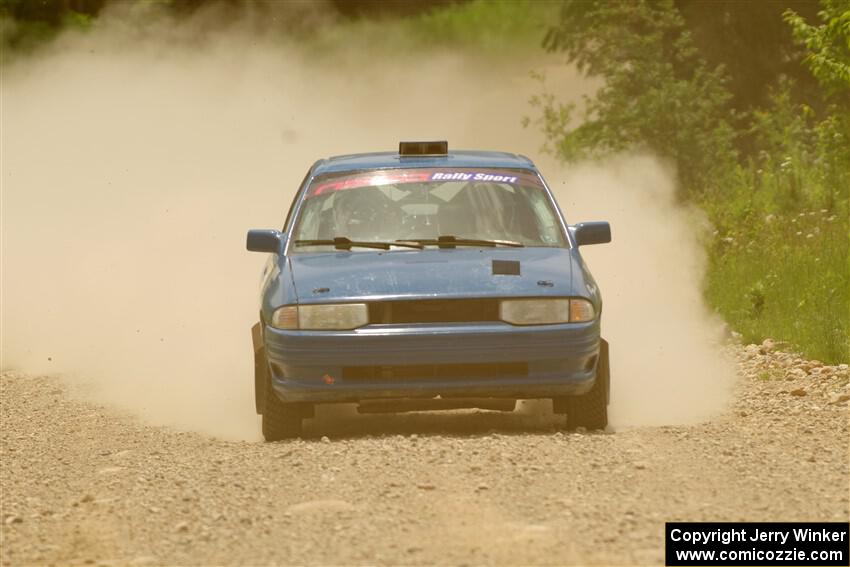 Jacob Kennedy / James Smith Ford Escort GT on SS1, Camp 3 North.