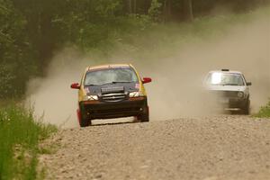 James Walker / Yannis Burnell Chevy Aveo and Josh Nykanen / Connor Himes VW GTI on SS1, Camp 3 North.